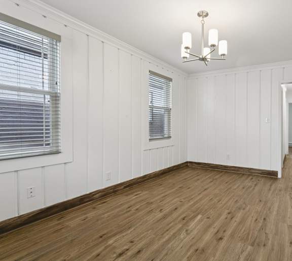 A room with wooden floors and white walls. at Shipyard Shores Apartments, Newport News, 23607