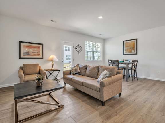 a living room with a couch and a coffee table