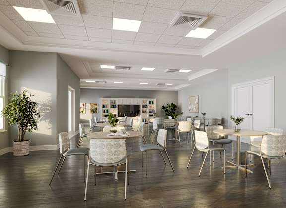 A modern dining room with a large table and chairs. at Divinity Landing Apartments, Macedonia, 44056