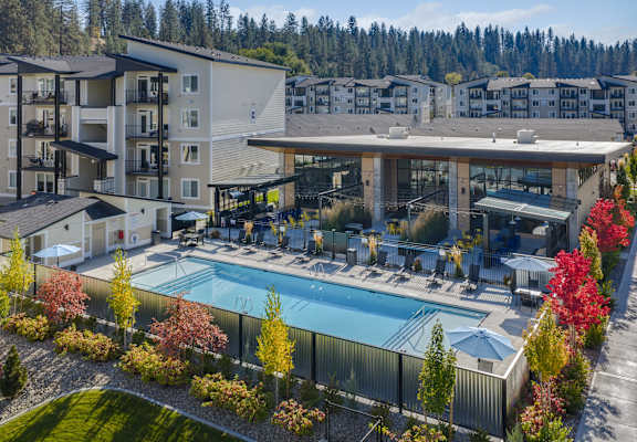 A large building with a pool in the middle of it.