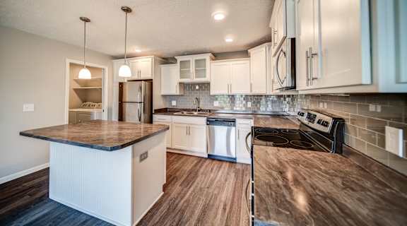 Pine Lane Estates Apartments in Lansing | Kitchen in apartment