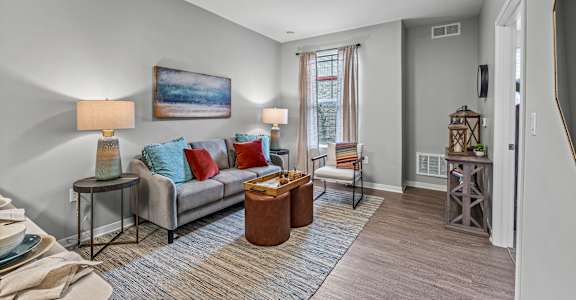 a living room with a couch and a table
