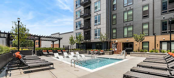 Aerial view of the lap-length pool with sundeck at Griffin Weston townhomes in Cary, NC.
