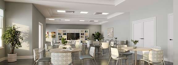 A modern dining room with a large table and chairs.