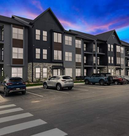 a rendering of a large apartment building with cars parked in front of it  at Prism at Diamond Ridge, Pennsylvania, 15108