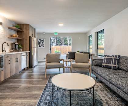 a living room with a couch and a table