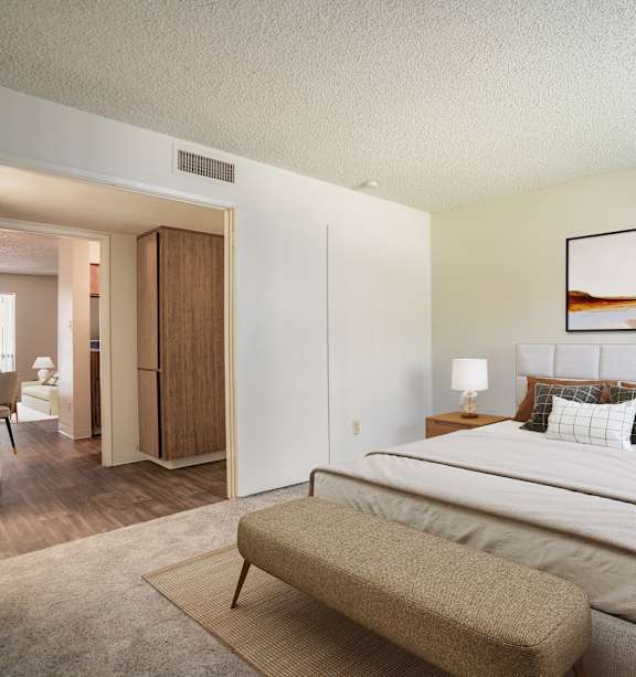 Bedroom with cozy bed at Eagle Point Apartments, New Mexico