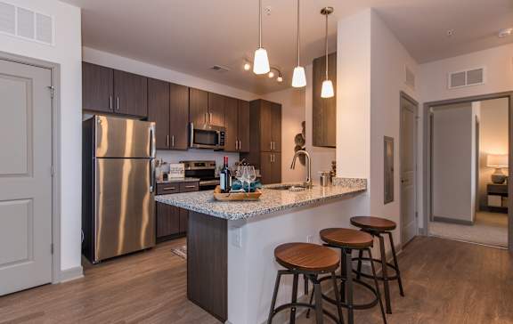 a kitchen or kitchenette at sonder east 5th at The Whitworth, Williamsburg, VA 23185