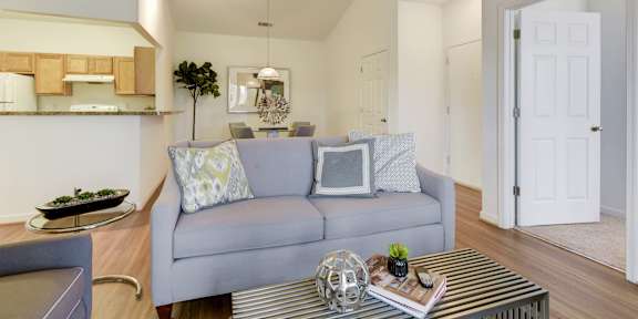 a living room with a couch and a coffee table