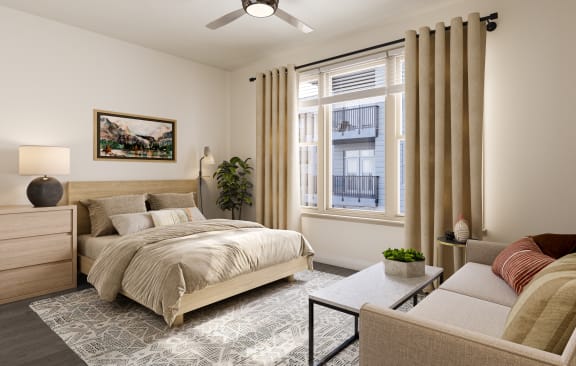 a bedroom with a bed and a ceiling fan at Link Apartments® Calyx, North Carolina, 27517