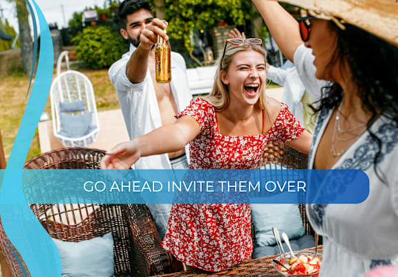go ahead invite them over text over a group of people sitting at a picnic table