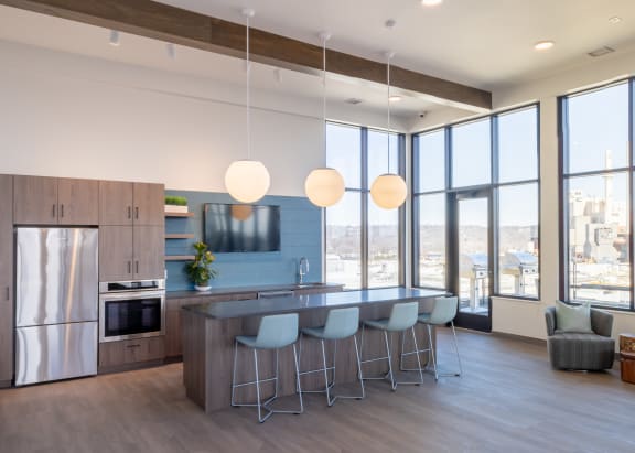 a view of the kitchen and living room from the dining area