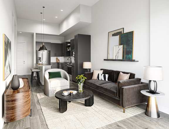 Model apartment living room with a couch and a coffee table