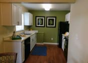 Thumbnail 3 of 13 - Kitchens with lot of storage and counter space ready for cooking at Fountains of Largo, Largo, Florida