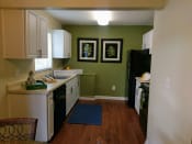 Thumbnail 3 of 13 - Kitchens with lot of storage and counter space ready for cooking at Fountains of Largo, Largo, Florida