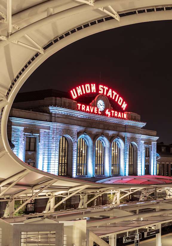 A large building with a sign that says Union Station in front of it.