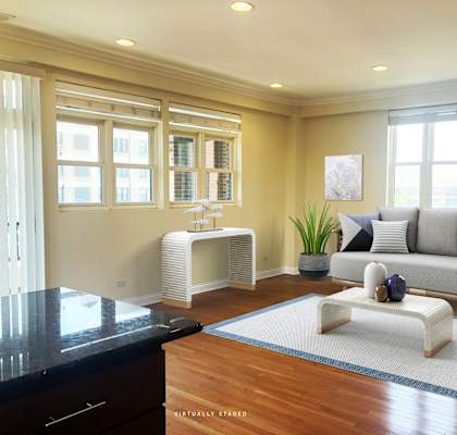 a living room with a couch and coffee table
