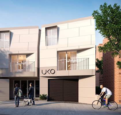 A modern building with the word UXO on the front.