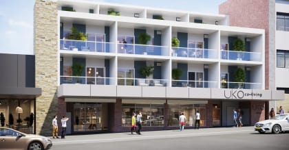 a rendering of a building with balconies on a city street