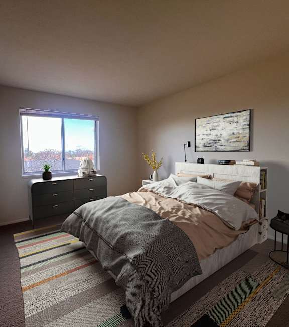A bedroom with a bed, dresser, and window. at Huntington Green Apartments, University Heights, 44118