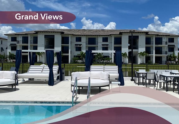 a picture of a pool with chairs and a building in the background