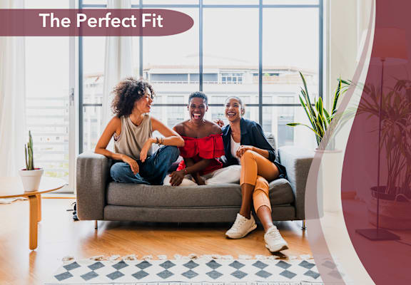 a group of people sitting on a couch in a living room