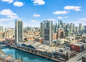 Thumbnail 43 of 47 - an aerial view of the city and the river