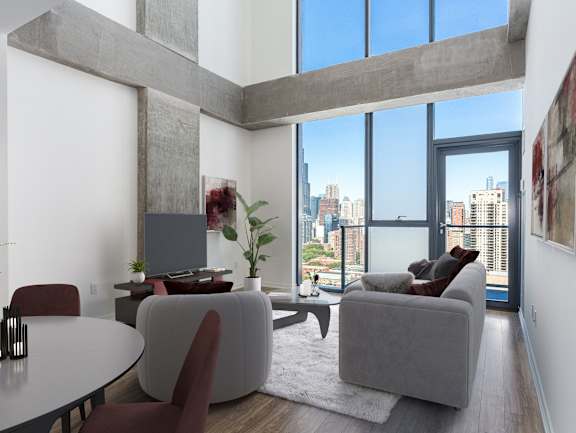 A modern living room with a view of the city at One 333, Illinois, 60605