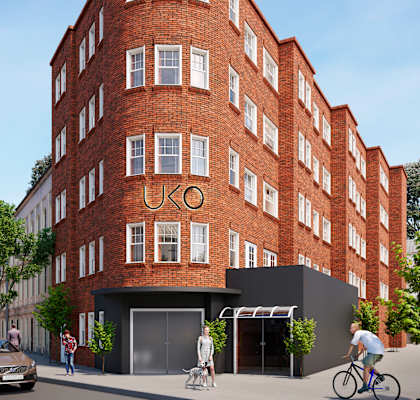 A red brick building with the letters "UKO" on the front.