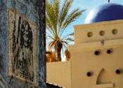 Thumbnail 5 of 46 - A building with a blue dome and a sign that says at Bautista Apartments, Tucson, Arizona