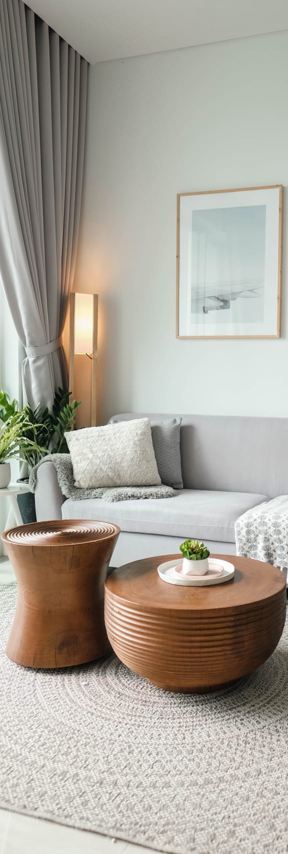 Living Room with a Grey Couch at The Montecito, Colorado Springs