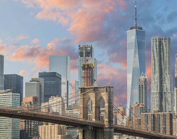 A bridge spans the East River in New York City.