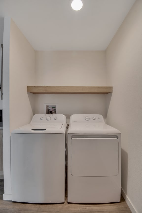 a washer and dryer in a laundry room