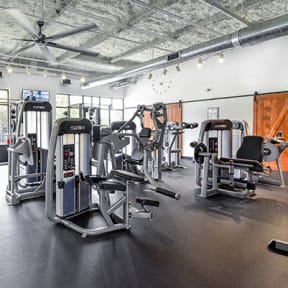 a picture of the cardio equipment in the gym