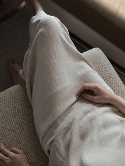 Woman Sitting On A Sofa at Lilia, Lilydale, MN