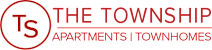 A logo with the letters "TS" in a circle and the words "The Township Apartments | Townhomes" below it.