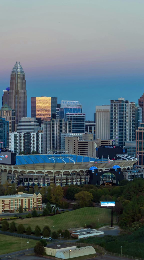 the skyline of the city at sunset  at Link Apartments® Mint Street, Charlotte, North Carolina