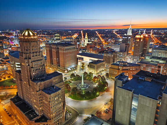 A cityscape at dusk at 100 South Apartments, Buffalo