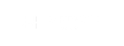 a game logo with the word heartwood in white