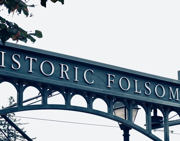 A bridge with the words "Historic Folsom" written on it.