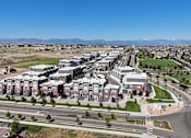 Thumbnail 7 of 8 - an aerial view of a city with buildings and a highway