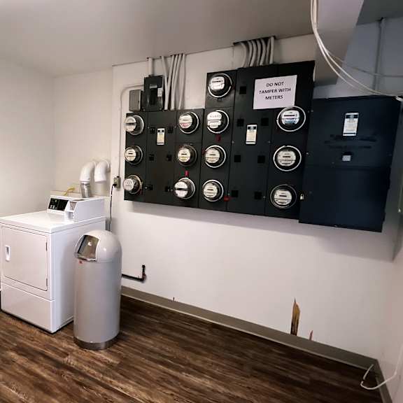 a bathroom with a sink and a toilet and a shower