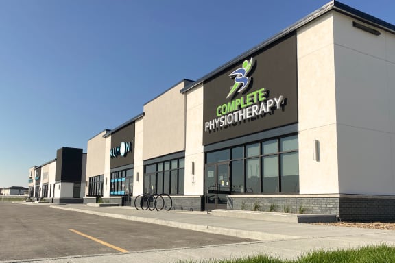 a large building with a sign that reads college phototherapy