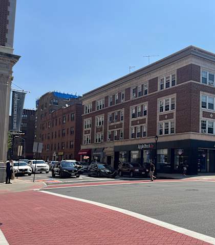 a large brick building on a city street