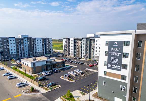 Apartment complex with a sign at The Fifth at Palisades, Edmonton, AB, T6V 0N5