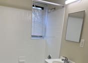 Thumbnail 19 of 19 - Clean and functional bathroom inside Meadowbrook Run apartment featuring contemporary fixtures, ample lighting, and easy-to-maintain surfaces.