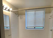 Thumbnail 18 of 19 - Clean and functional bathroom inside Meadowbrook Run apartment featuring contemporary fixtures, ample lighting, and easy-to-maintain surfaces.