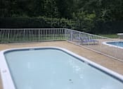Thumbnail 27 of 29 - Swimming pool with a white border. at New Carrollton Woods, Riverdale, MD