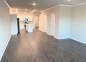Thumbnail 19 of 60 - B2 (2-car) Downstairs open concept living and dining facing the kitchen