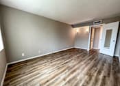 Thumbnail 9 of 28 - living room with hardwood floor